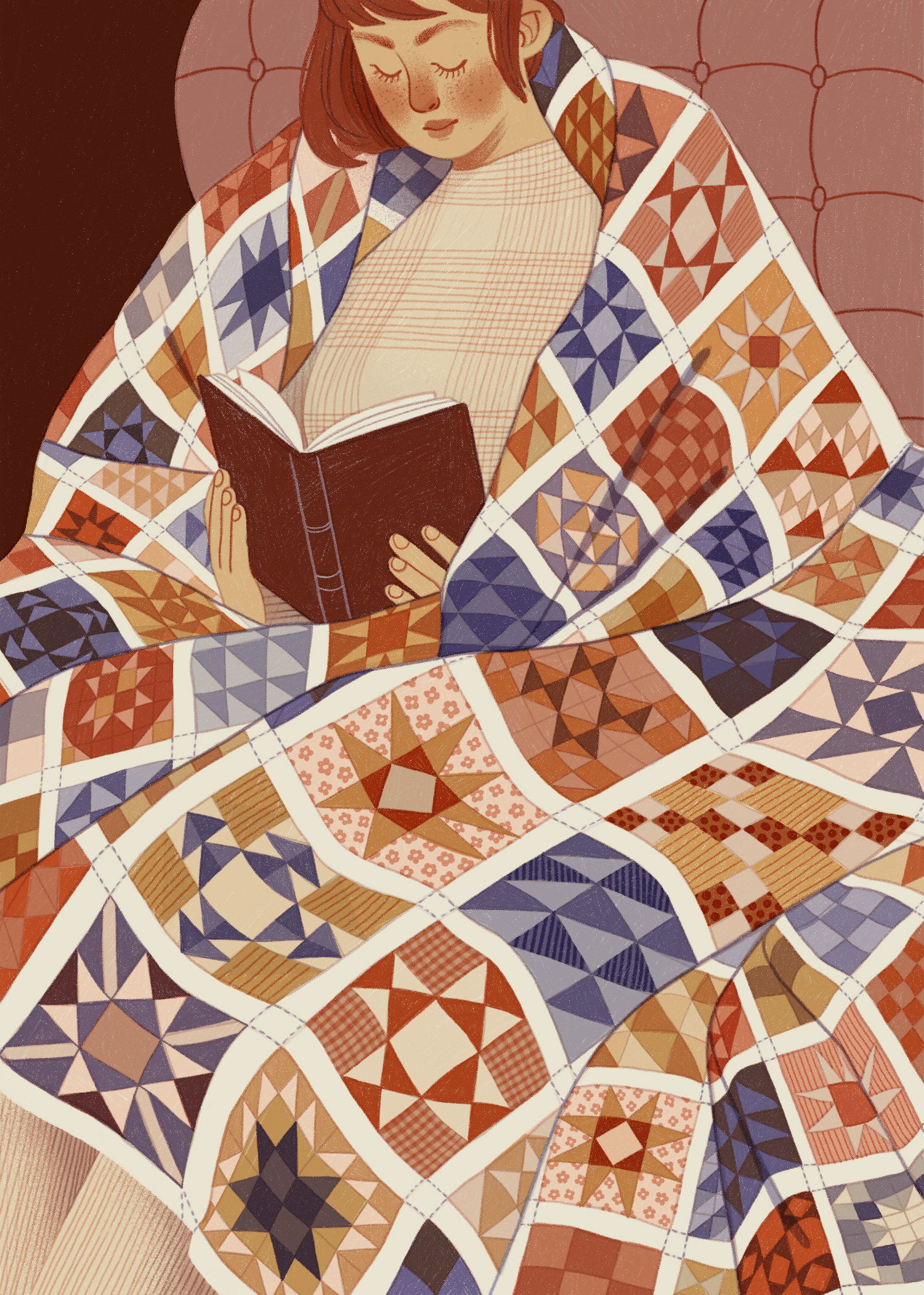 A girl sitting reading with a huge, warm quilt swaddled around her.