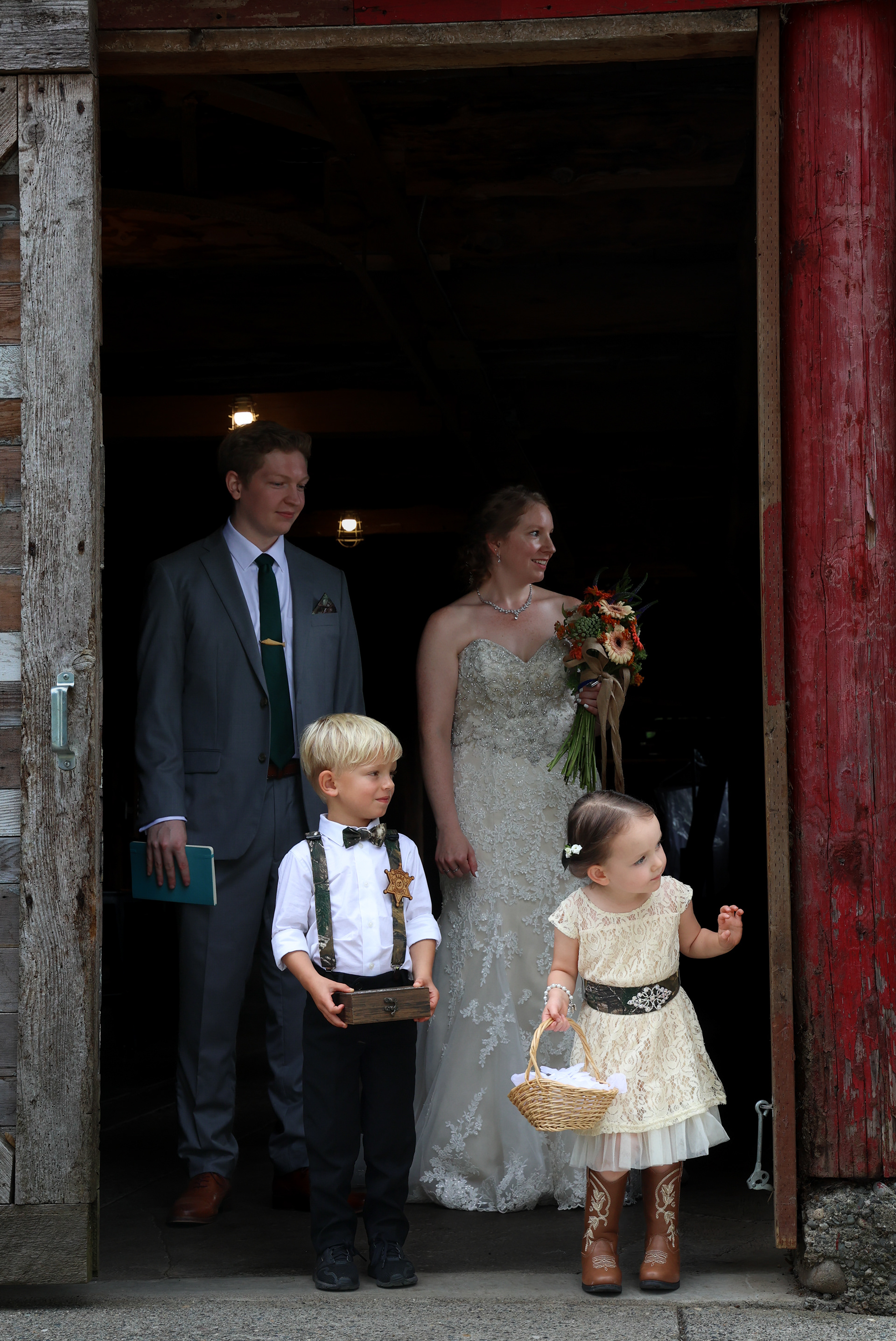 Sara, her officiant, ring bearer, and flower girl