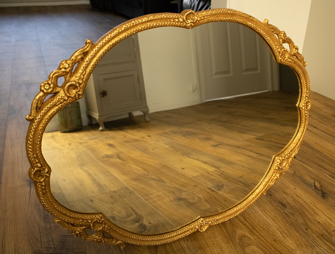 Upcycled Rare 1950's Ornate Vintage Metal Mirror. Hand painted by Blue Quartz Design in Annie Sloan Old White and Shabby Chic Gold chalk paint, aged with dark wax and highlighted with bright gold gilding wax.