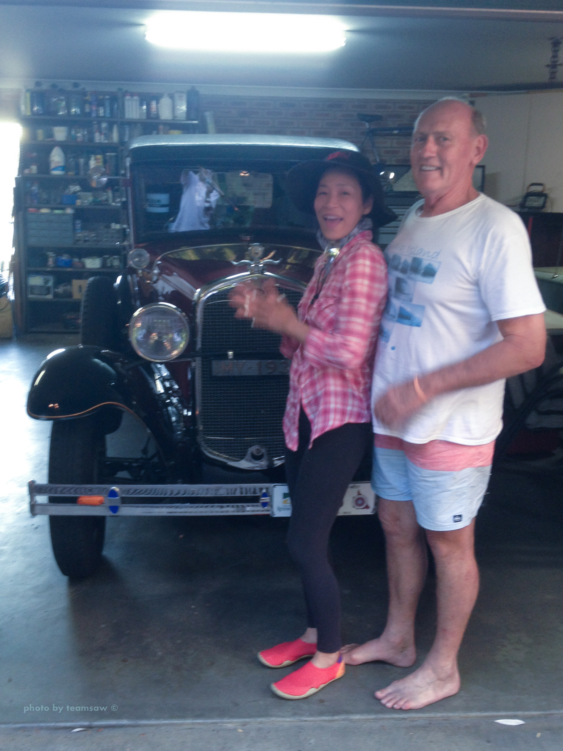 Photo of Ken, me, and his maroon coloured car at his garage. (Please let me know this car's nickname, if you know it) Photographed by my husband.