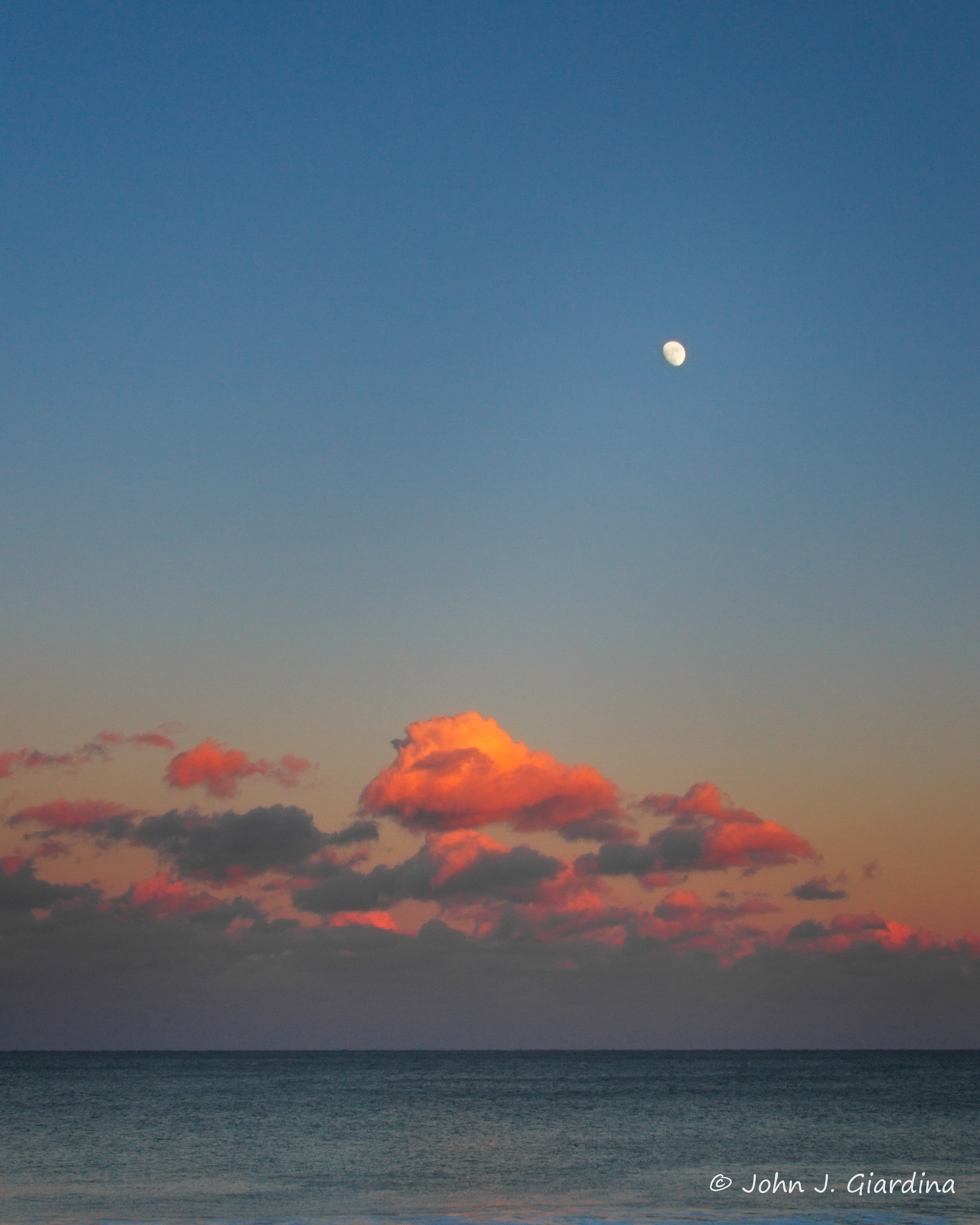 Sunset Moon Over the Horizon