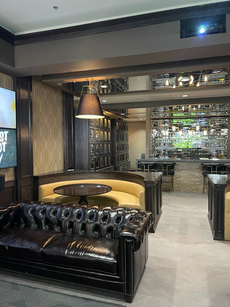 Club 1920 atmosphere defined by texture, tone and hospitality-driven architecture.