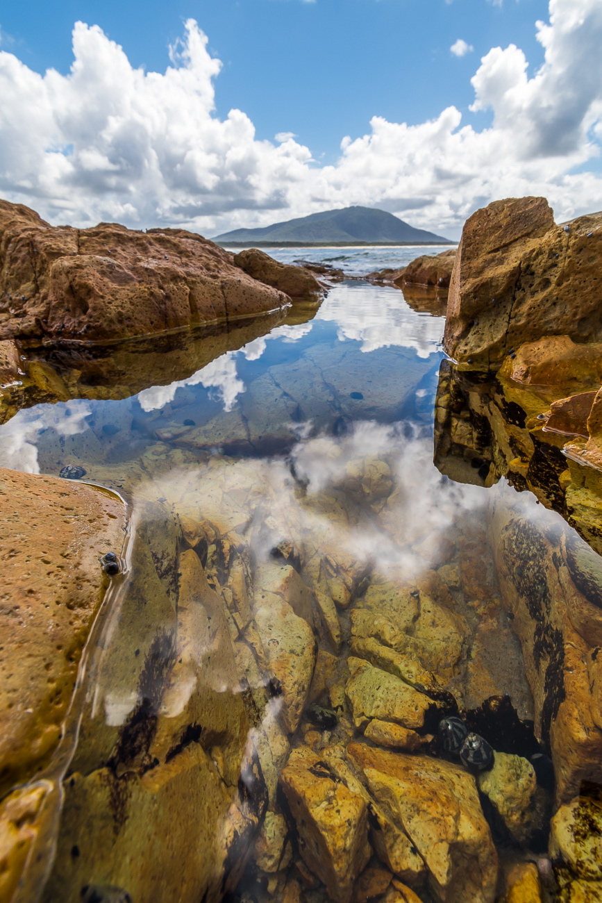Rockpool Reflections - Diamond Head NSW Australia.  Calm rockpool reflections - Image taken 7-4-21