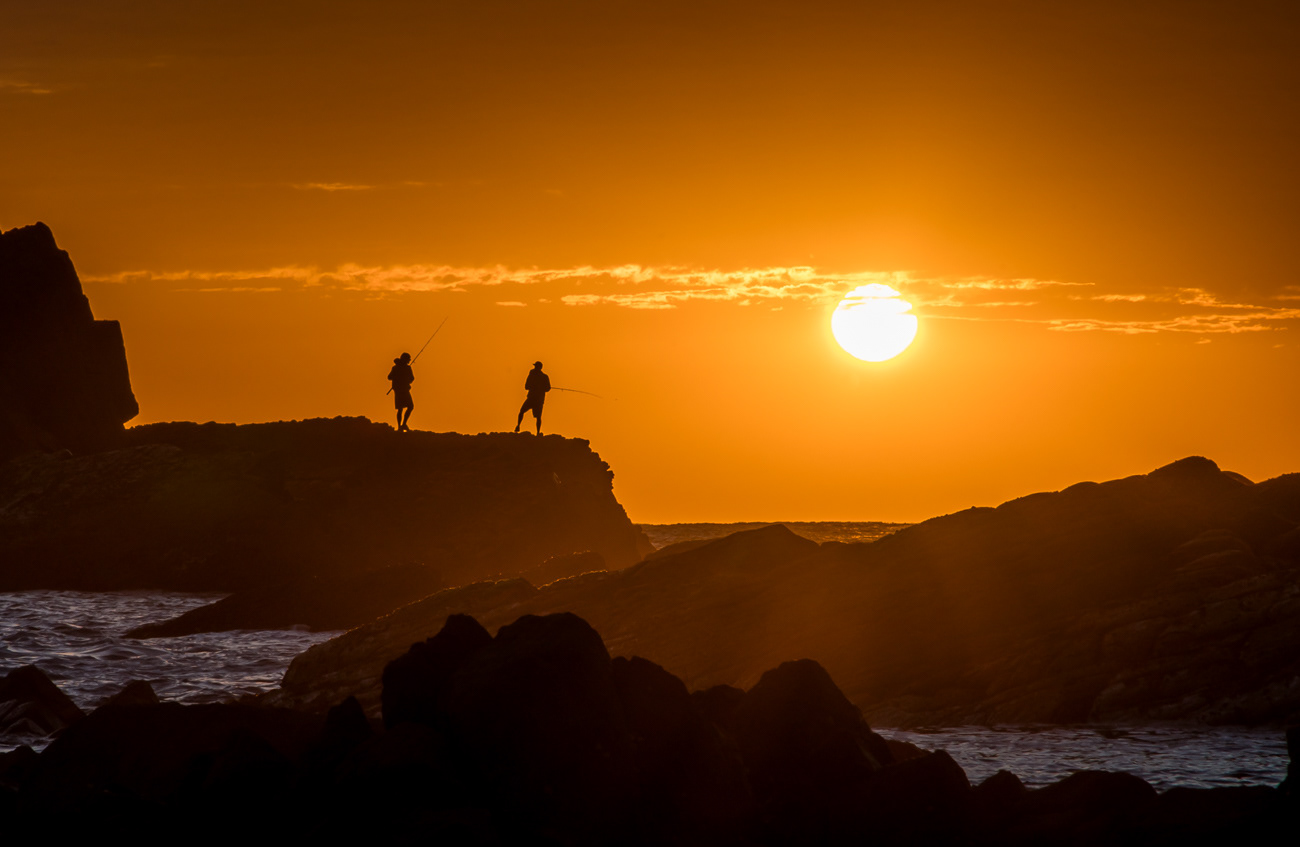 Catching the Sunrise - Crescent Head NSW Australia.  Fishermen trying their luck on the rocks at sunrise - Image taken 16-4-21