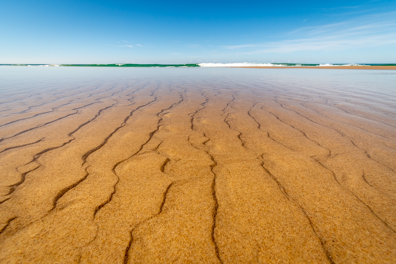 Sand in Motion - Brooms Head NSW Australia.  Sand formation under a shallow water layer - Image taken 19-6-23