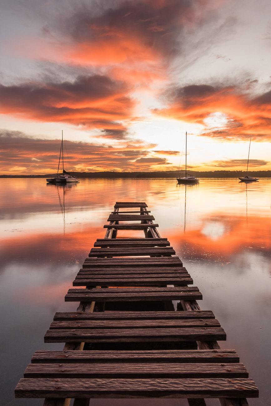 Weathered Beauty - Sunshine Lake Macquarie NSW Australia.  An old weathered wharf with stunning sunrise backdrop - Image taken 21-6-22