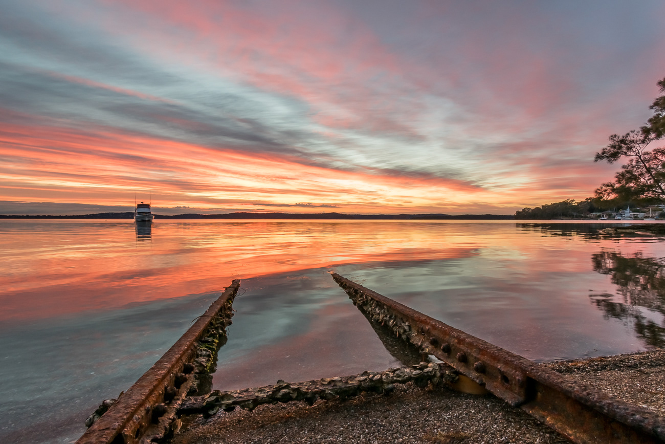 Track to Tranquility - Balcolyn, Lake Macquarie NSW Australia.  Old boat rails leading to a beautiful morning - Image taken 29-8-19