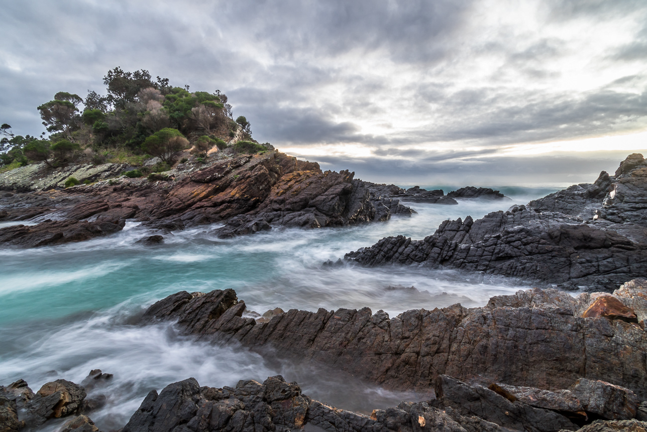 Waves meet Rocks - Seal Rocks NSW Australia.  Cloudy sunrise with good water flow - Image taken 1-8-20