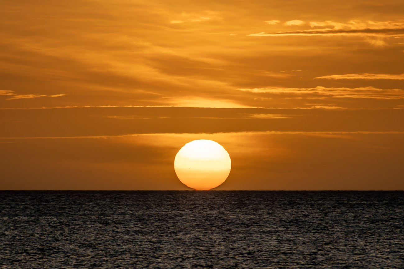 Touching the Horizon - Alau Beach QLD Australia.  Nothing like a top end of Australia sunset - Image taken 9-8-23