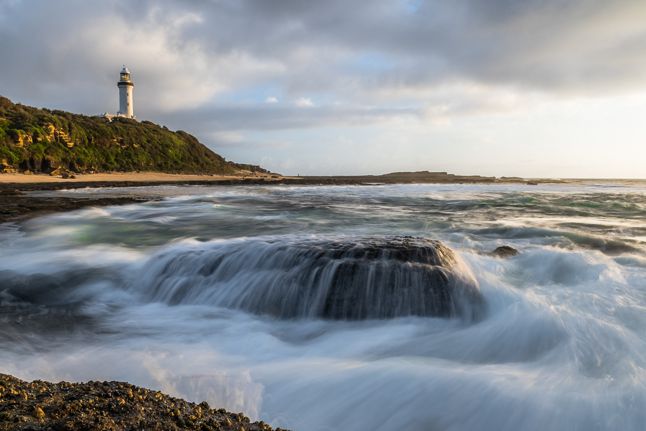 Ocean Waterfall - Norah Head NSW Australia.  Lovely water flow over rocks at sunrise - Image taken 5-12-20