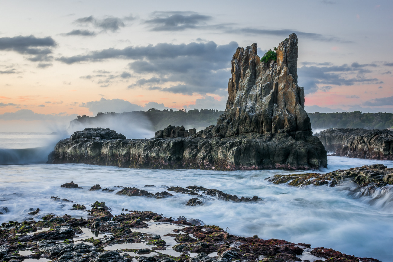 Majestic cathedral rocks - Kiama NSW Australia.  Waves crashing over cathedral rocks after sunrise - Image taken 5-8-19