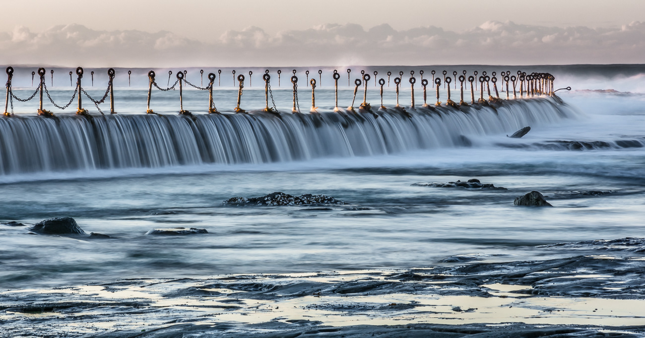 Canoe Pool Water Flow - Canoe Pool, Newcastle Ocean Baths NSW Australia.  Water flow over the canoe pool at sunrise - Image taken 13-8-19