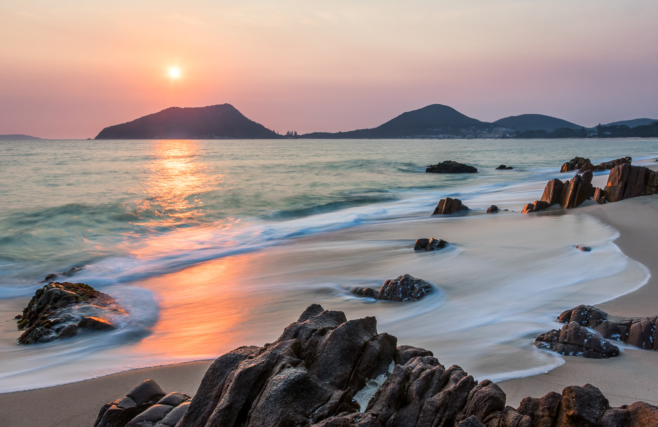 Smokey Sunrise - Port Stephens NSW Australia.  Bush fire haze created lovely colours at sunrise - Image taken 2-11-19