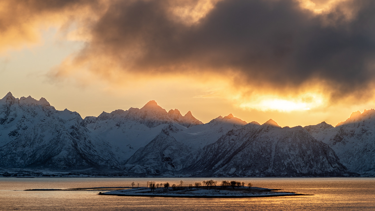 Sunrise in Lofoten Islands, Norway.  Stunning sunrise while cruising through Lofoten Islands on Hurtigruten MS Trollfjord - Image taken 20-11-23