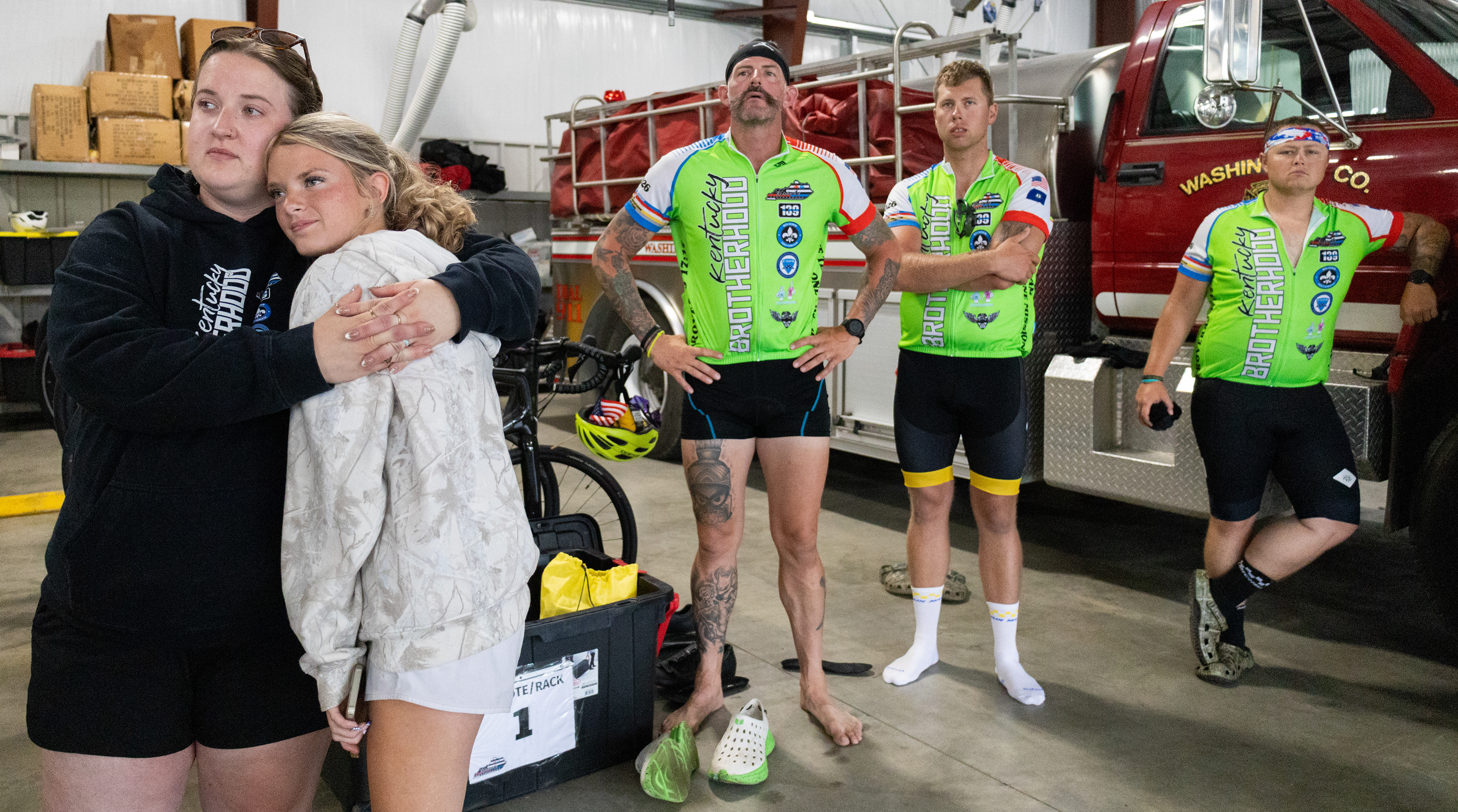 Hanna Spanyer, left, hugs Payson Sexton at the Springfield Fire Department in Springfield, Kentucky., before the Kentucky Brotherhood riders depart for their final stop on July 24, 2026. Kentucky Brotherhood is a nonprofit organization whose members ride bikes across Kentucky, day and night, to honor fallen first responders.