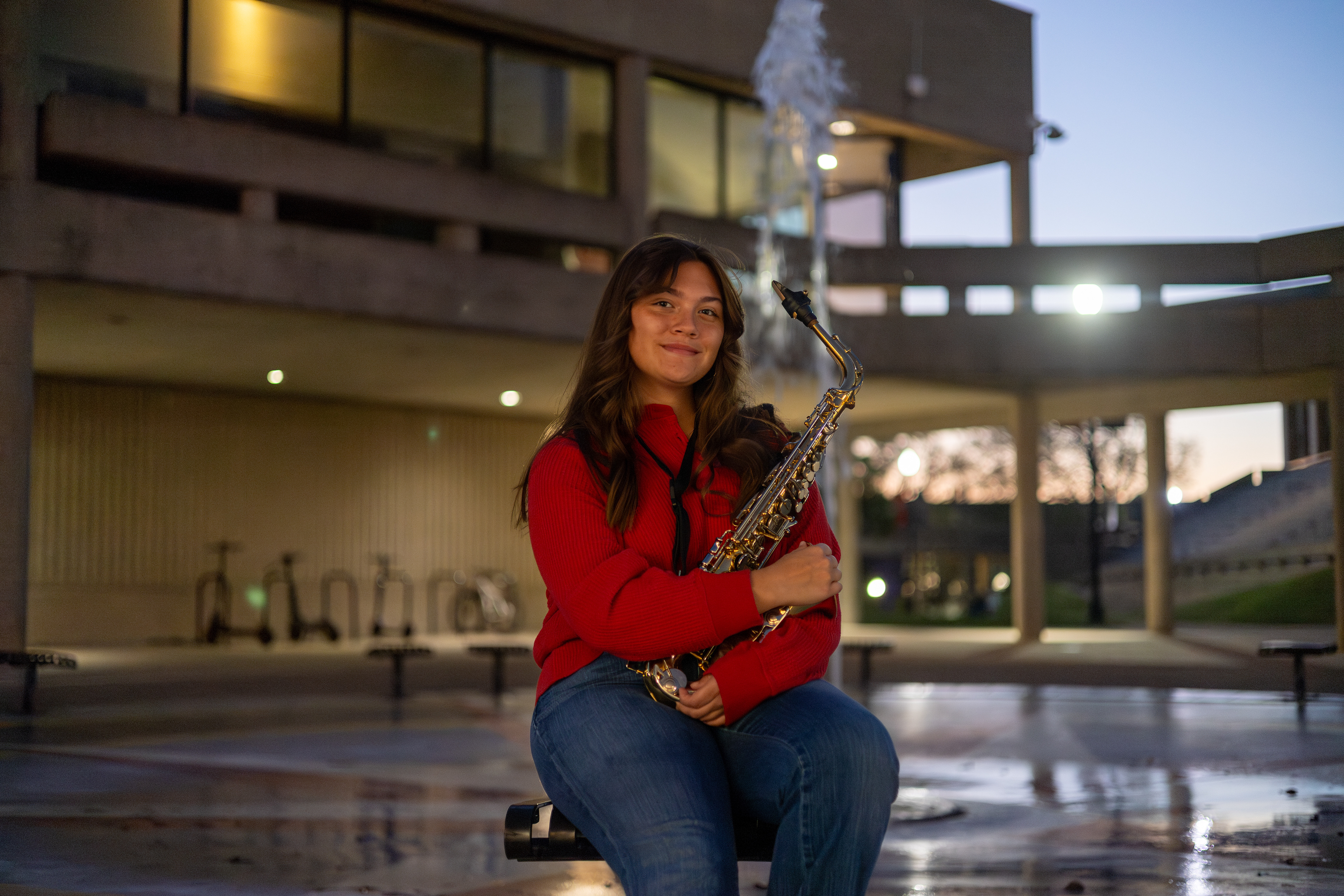 Maddie Gootee poses with her saxophone at Western Kentucky University on Oct. 8, 2025. “Playing saxophone — as cringey as it sounds — saved my life,” Gootee said. “Music gave me a way to express myself and a community that never stopped believing in me.” Now, as a music major, Maddie hopes to become a music teacher and inspire others the way band inspired her.