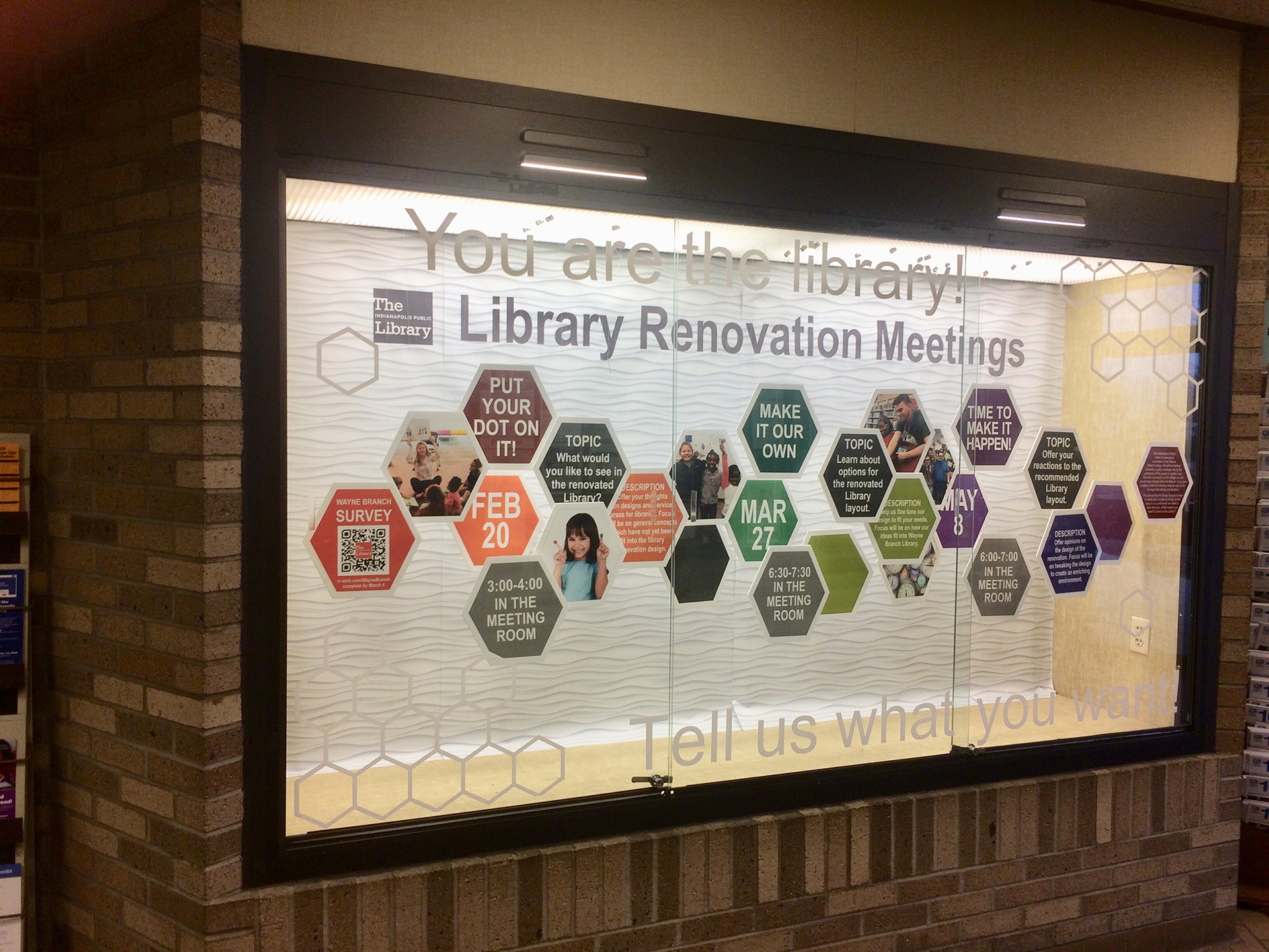Library display case inviting community feedback