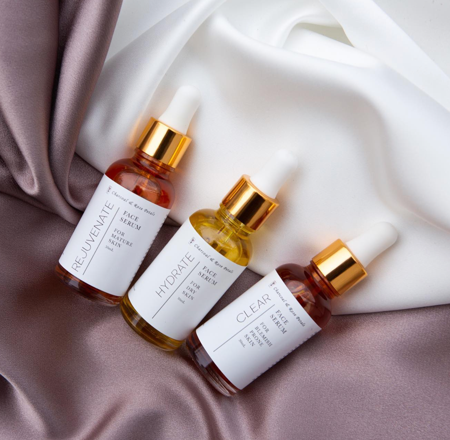 Label design for Charcoal & Rose Petals