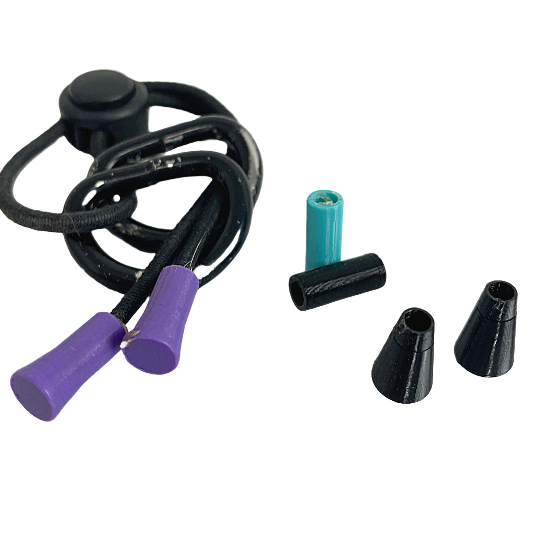 Cord Ends have been one of the most successfully integrated 3D part into our hard goods. The cylinders in the middle were the earliest followed by the flared ends seen left. These designs were too heavy and would hurt when the dogs swung their heads around. The final design seen right is light, efficient, and doesn't hurt. Their open backs improve the assembly process.