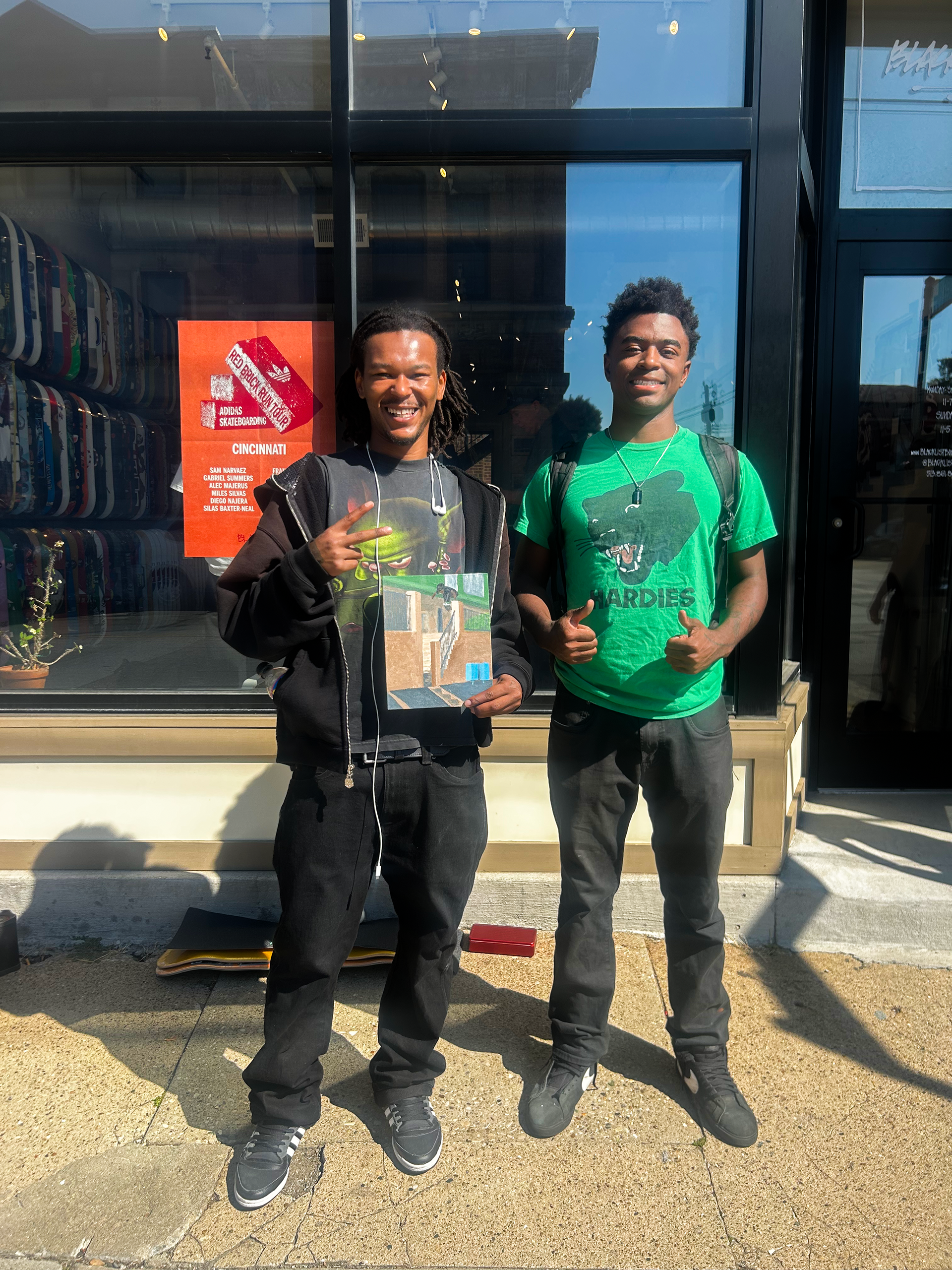 Me giving one of my favorite pro skaters Na-Kel Smith a painting I made him!