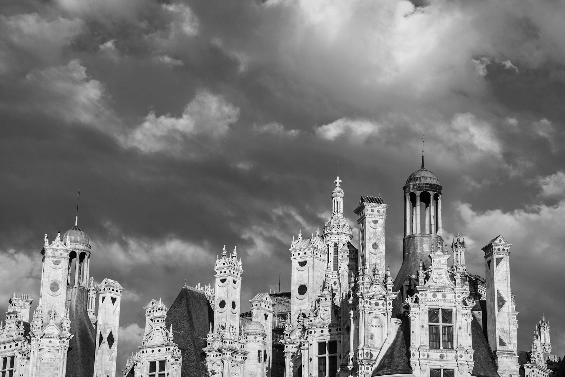 Roof of Château de Chambord in clowds