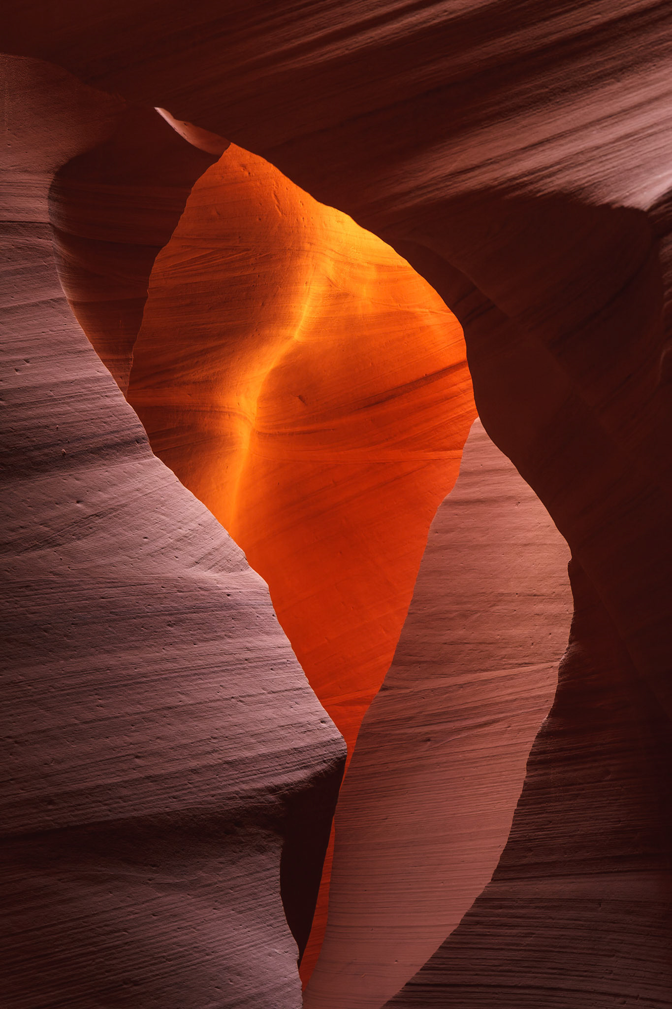 Light in Lower Antelope Canyon paints on rock formations