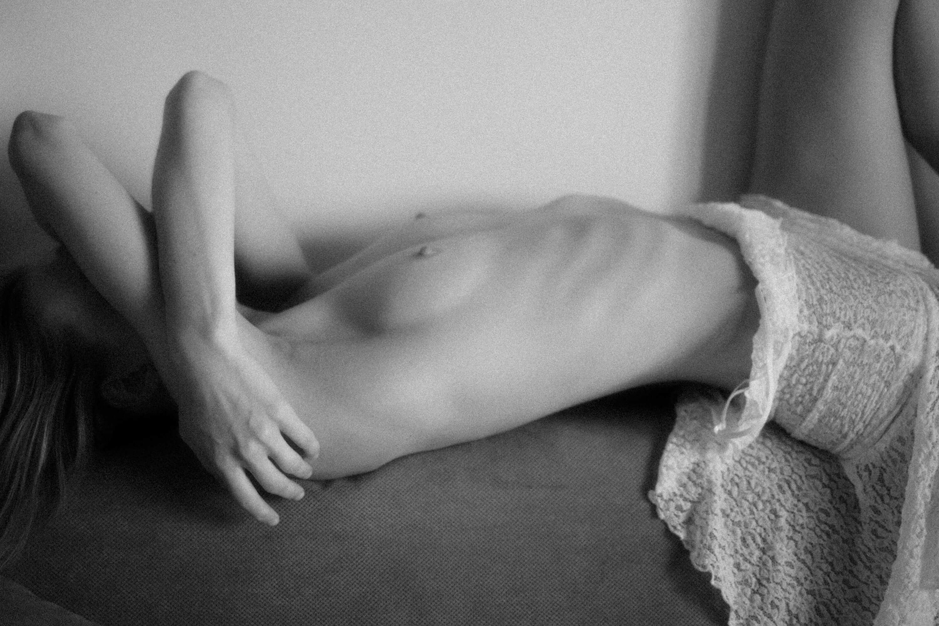 fine art nude torso detail in soft light