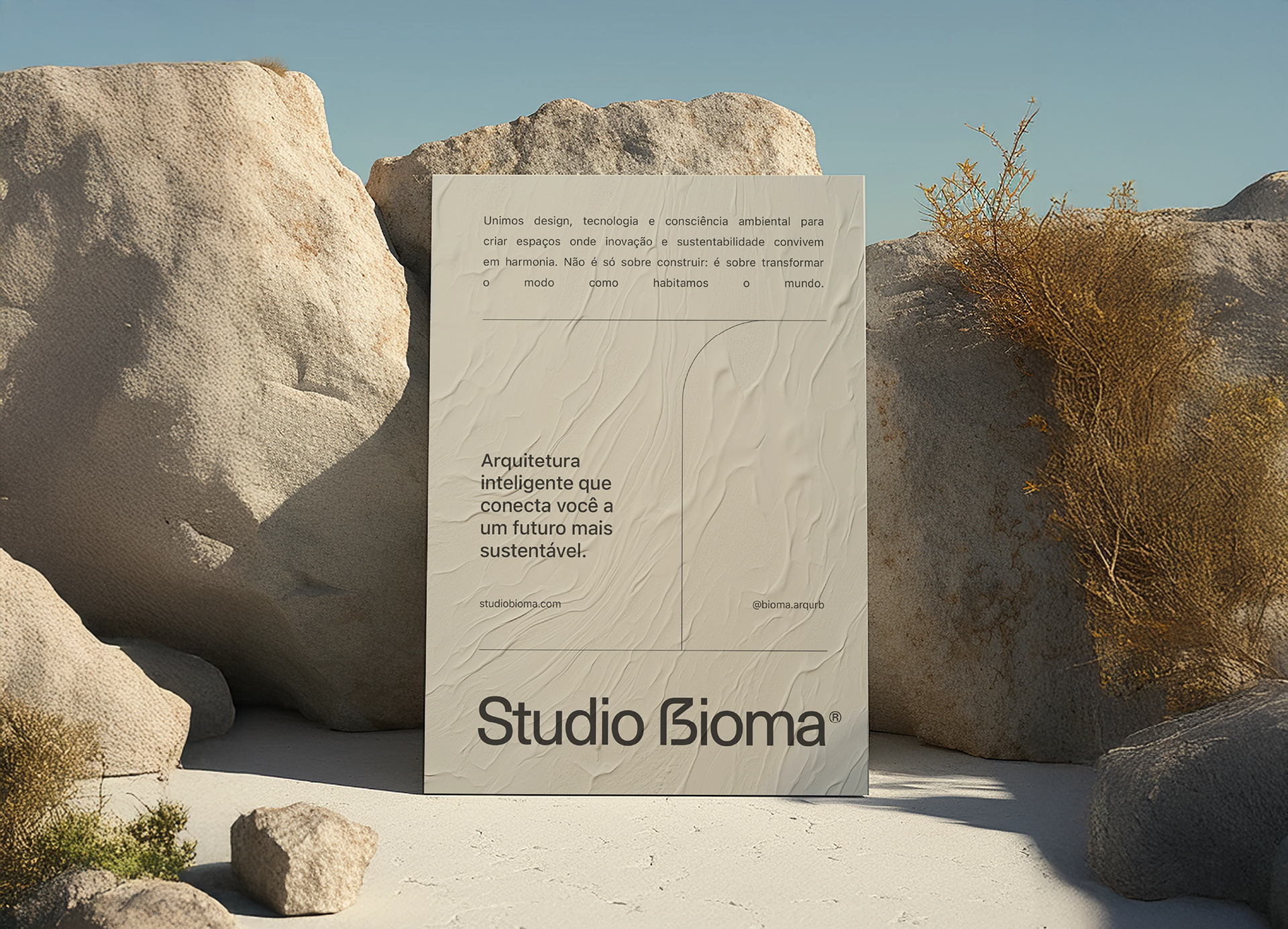 Cartaz do Studio Bioma exposto em ambiente natural com textura e manifesto – branding conectado à natureza e arquitetura consciente.