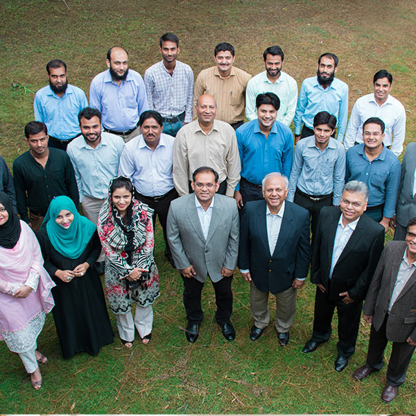 Corporate office team group photo – professional workplace photography in Lahore