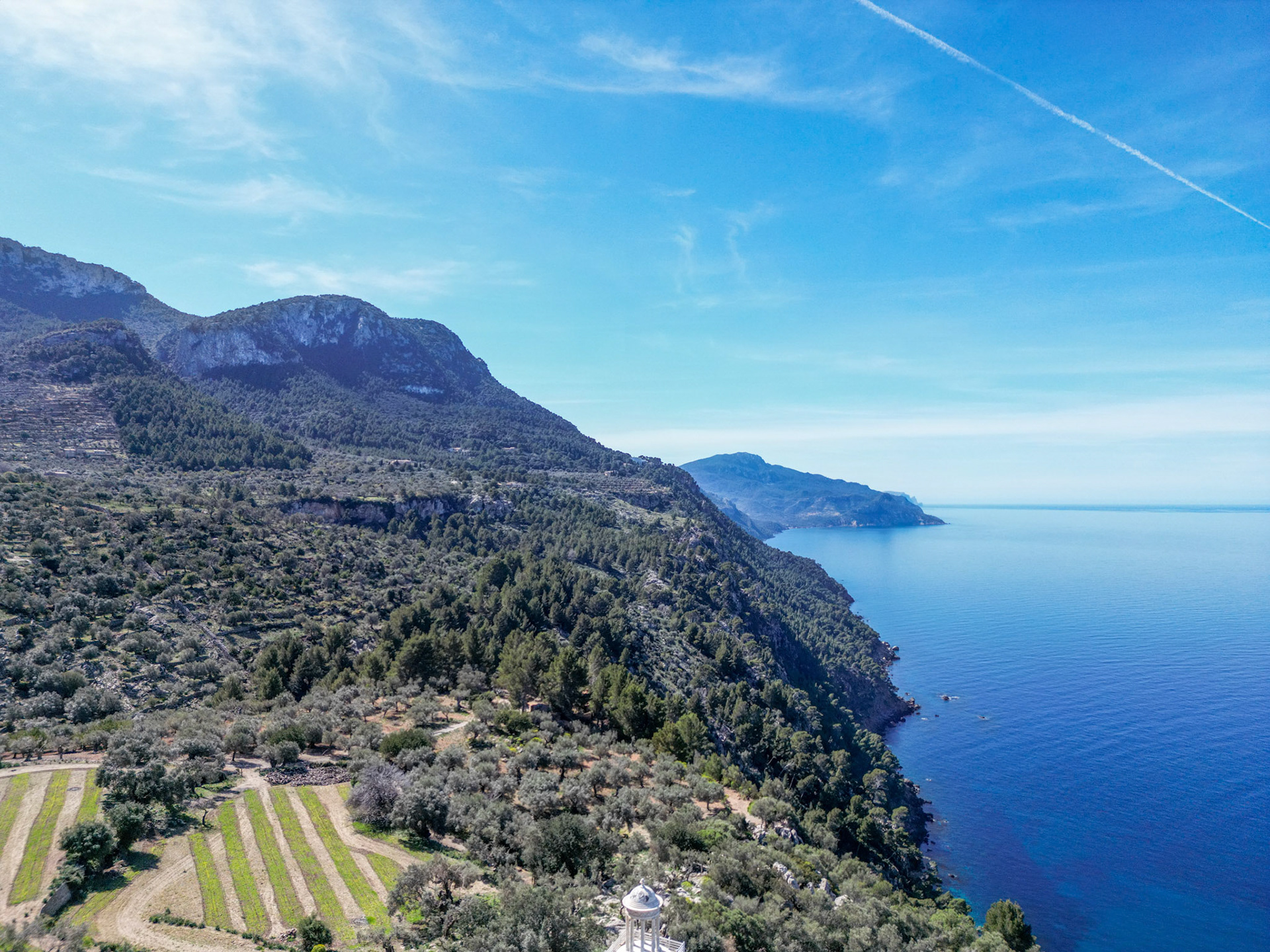 Drone photo of the mountains and sea near Deia in Mallorca for Med Vida Lifestyle Blog
