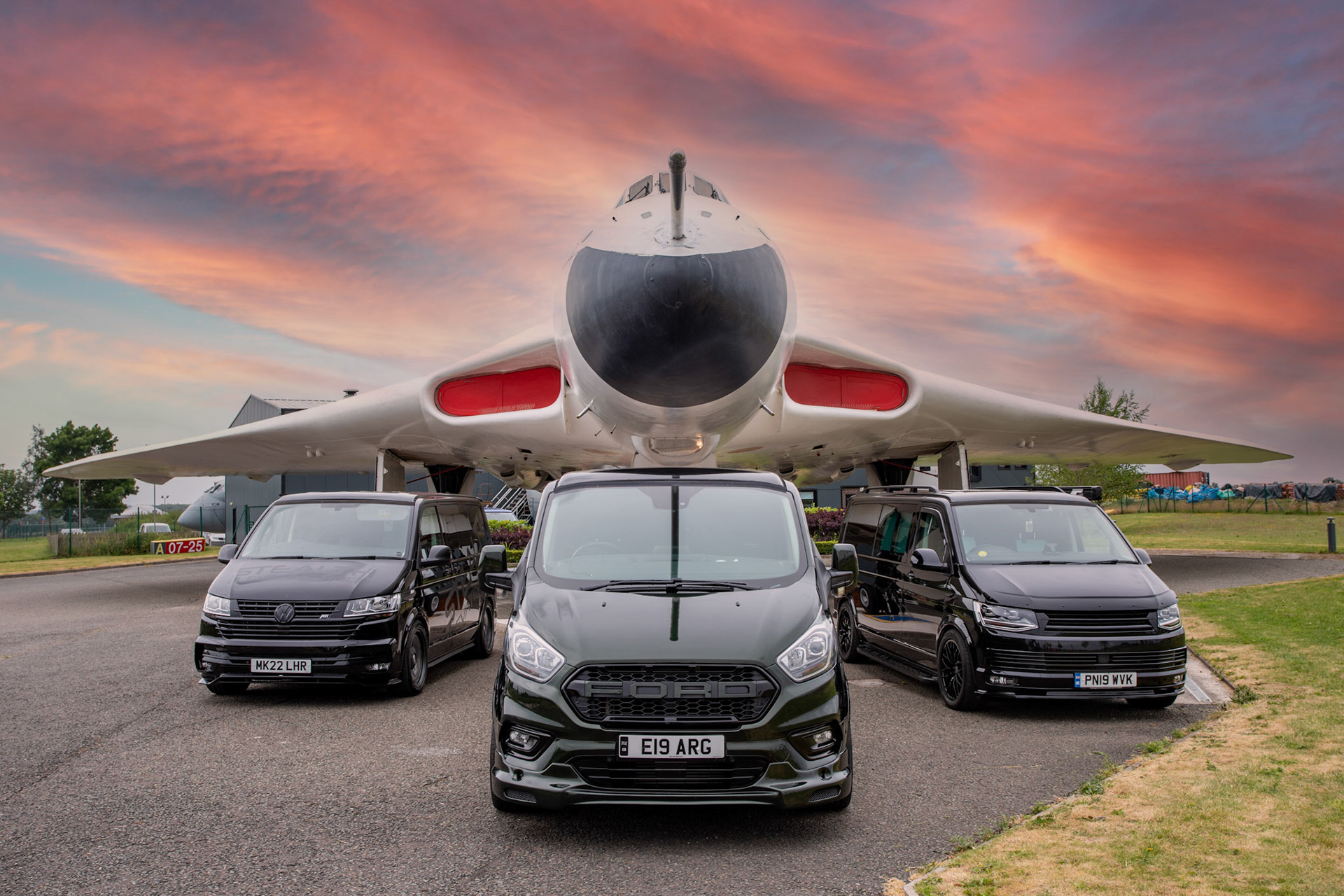 Photo of camper vans in front of Vulcan bomber fighter plane for Van & Bus