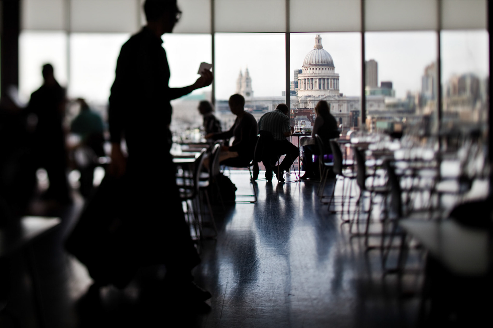 Patrons dine with a view of St Pauls Cathedral at the Tate Modern.