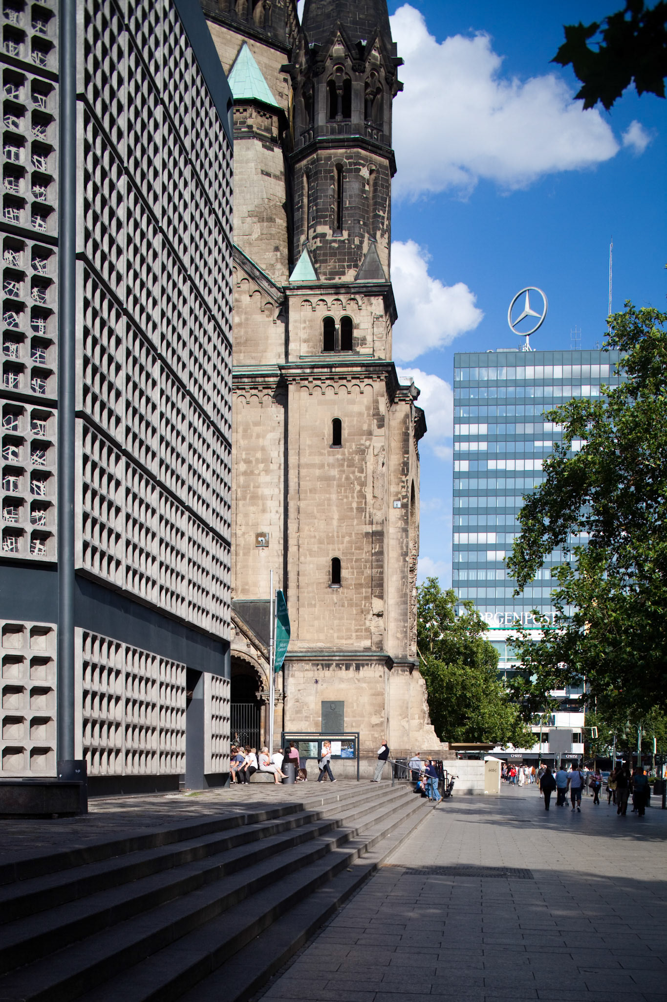 Berlin, Germany, July 24 2009, The historic Kaiser Wilhelm Memorial Church stands next to its modern counterpart, drawing visitors in Berlin’s Breitscheidplatz area.