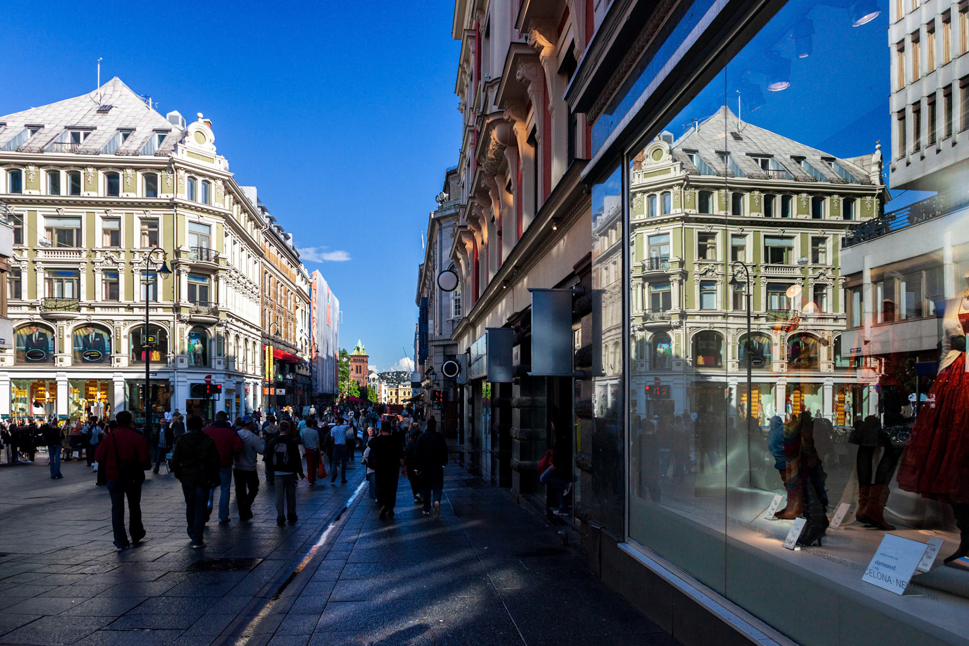 Oslo, Norway, Aug 10 2017, People stroll along Calle Karl Johans in downtown Oslo, enjoying the sunny weather and vibrant atmosphere of the city center.