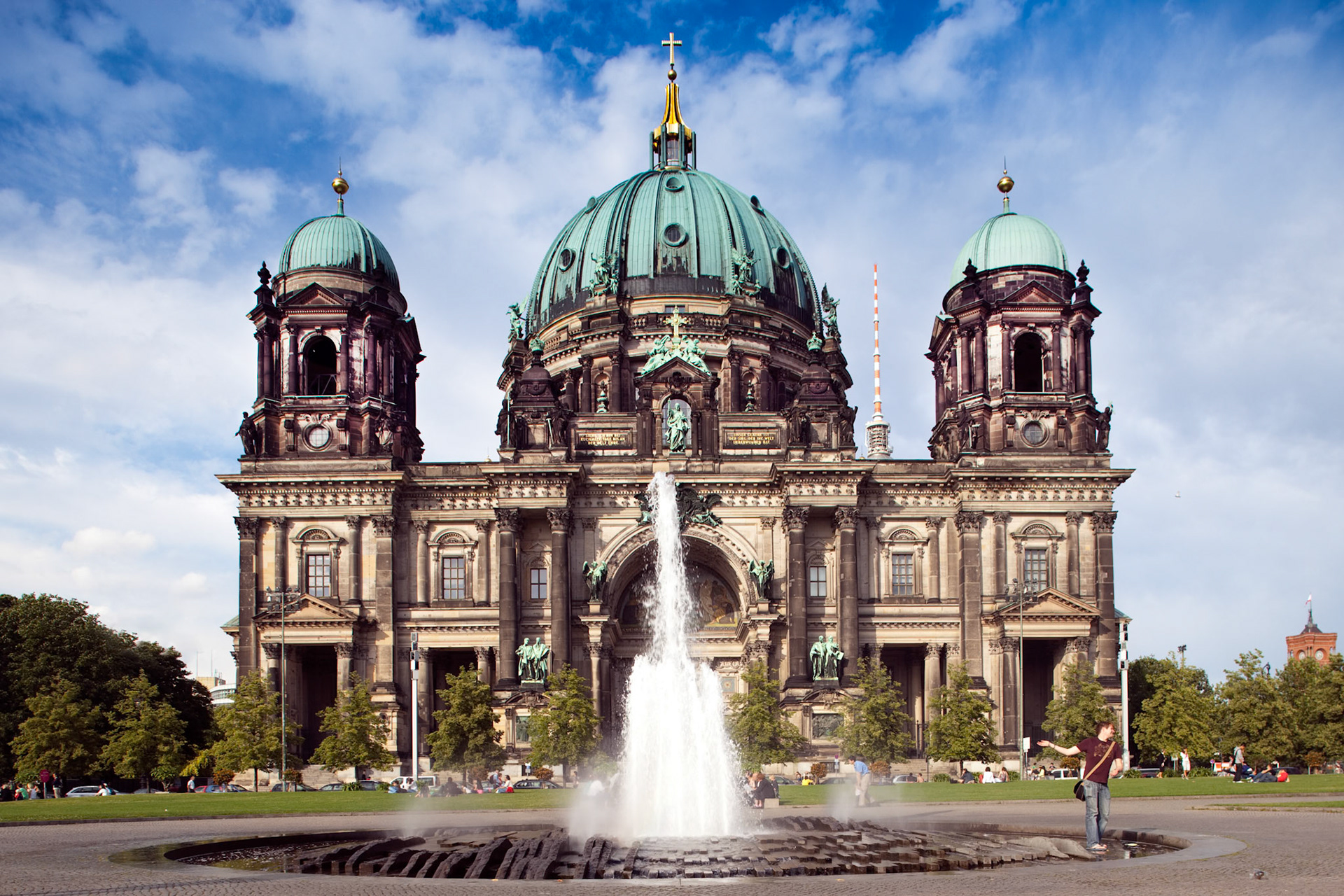 Berlin, Germany, July 24 2009, The stunning facade of Berliner Dom stands majestically at Lustgarten, featuring a fountain and surrounding greenery in Berlin, Germany.