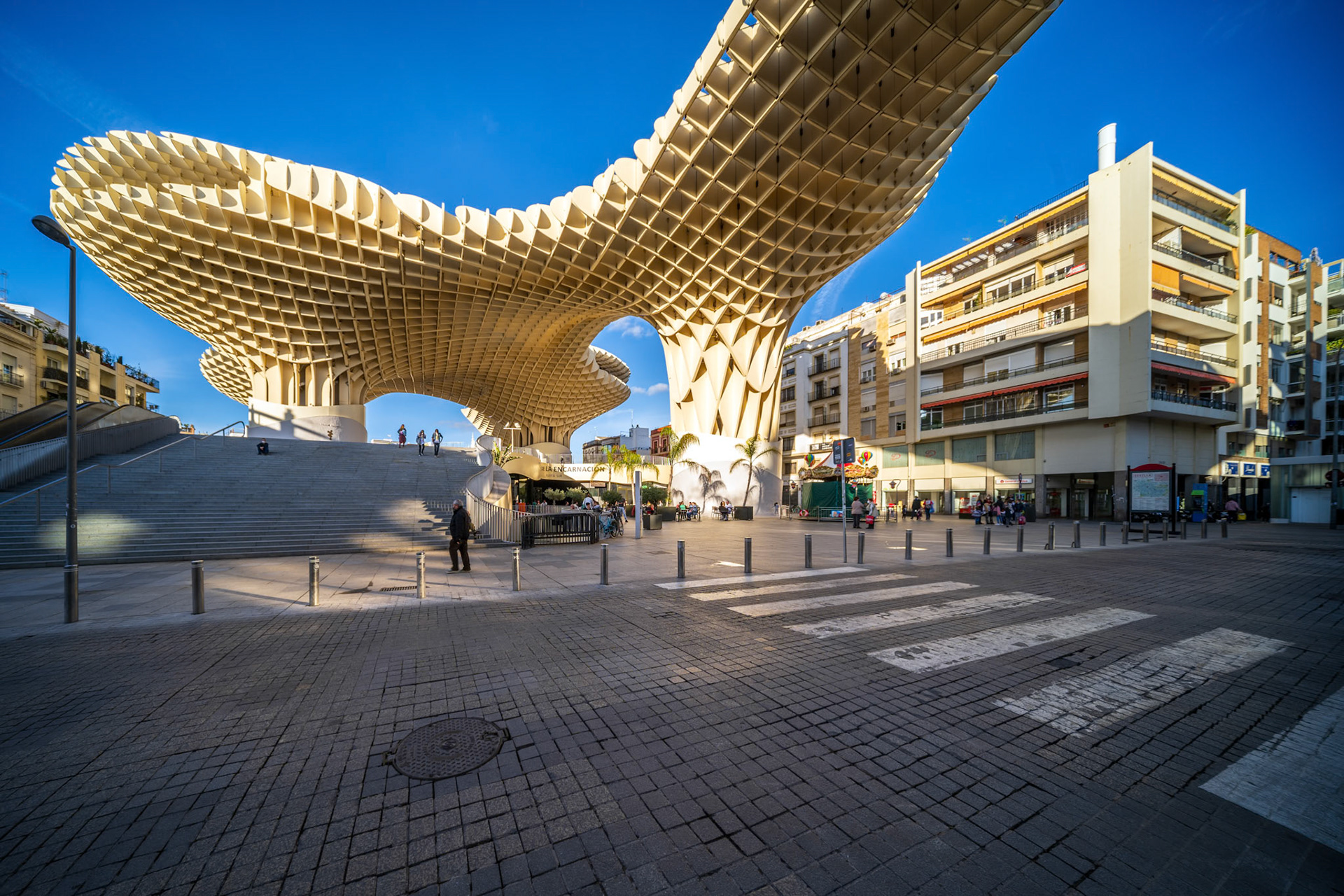 Seville, Spain, Jan 28 2021, Captivating view of Las Setas, a modern architectural masterpiece in Seville, Spain. The structure's intricate design is highlighted by a clear blue sky.