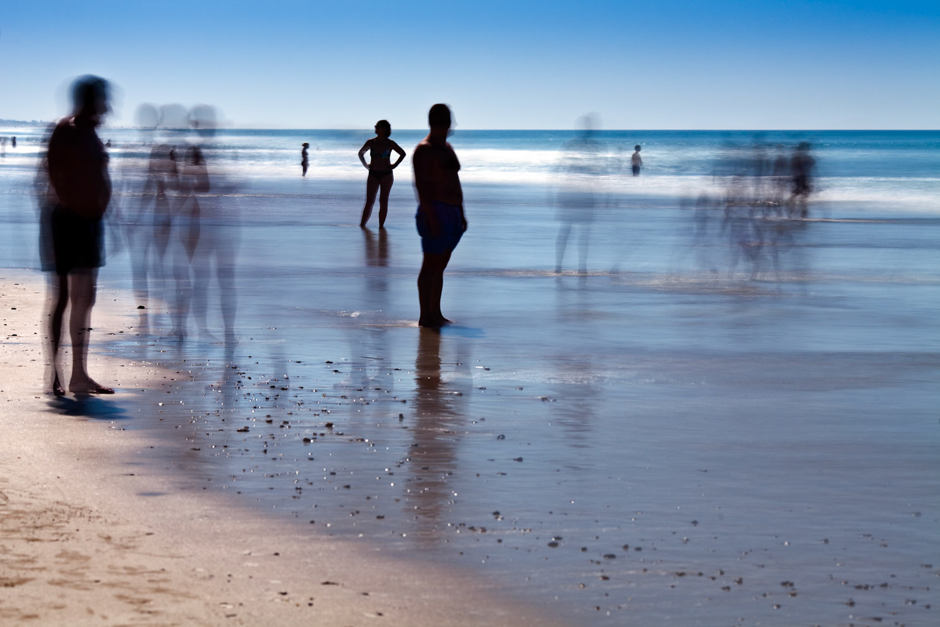People on the beach. Daylight long exposure shot by the use of neutral density filters.