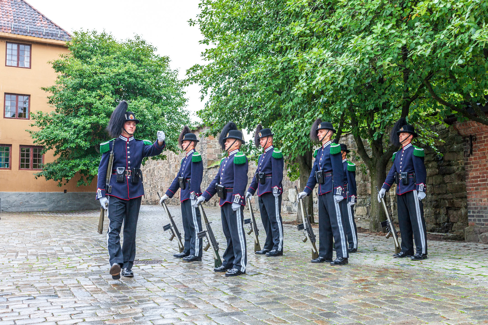 Oslo, Norway, Aug 10 2017, Guards dressed in traditional uniforms perform the changing of the guard at Akershus Castle in Oslo, showcasing military precision.
