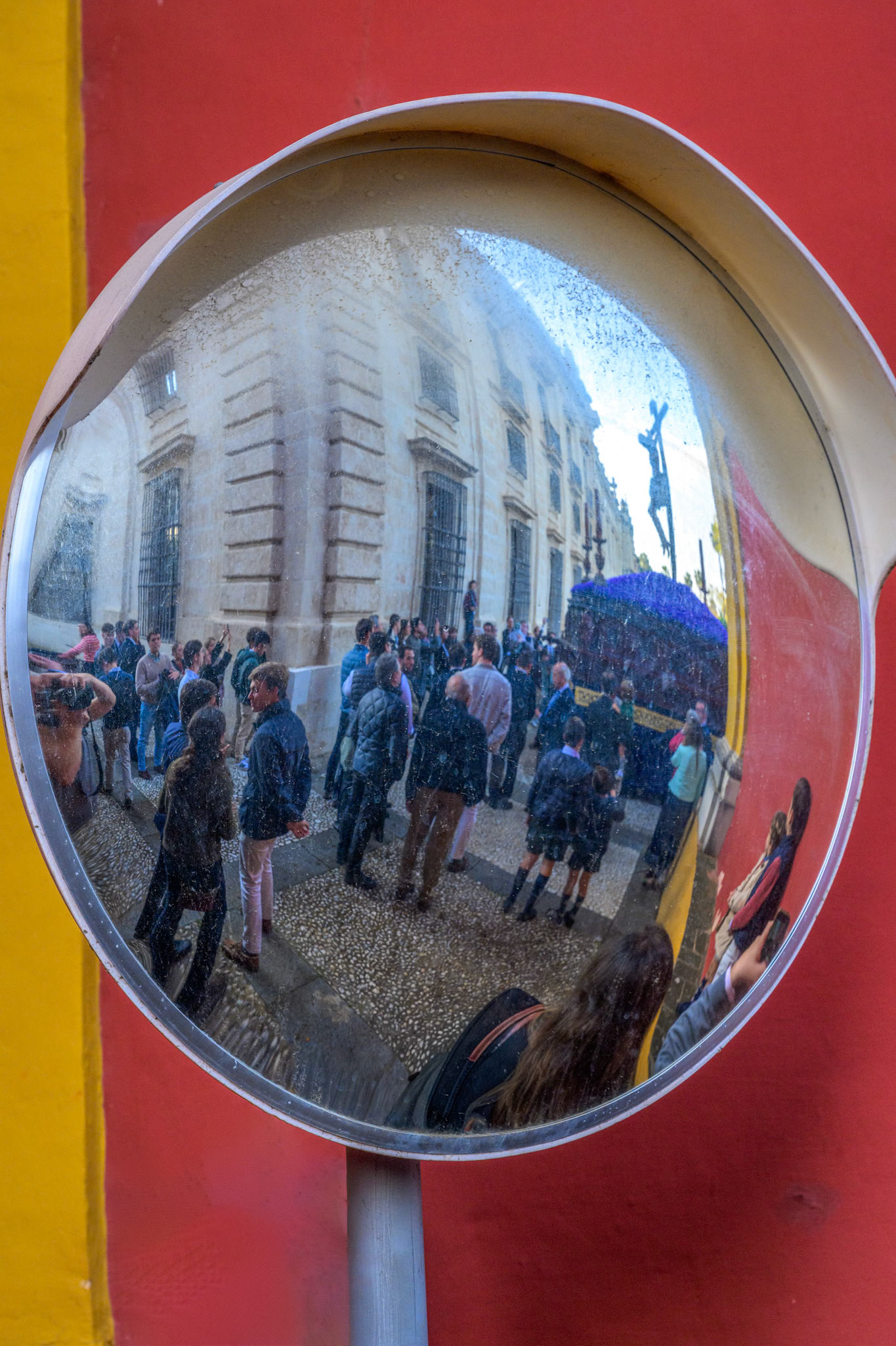 Christ of Buena Muerte (Good Death) of Estudiantes Brotherhood, reflected in a convex mirror on university grounds. Holy Week, Seville, Andalusia, Spain.