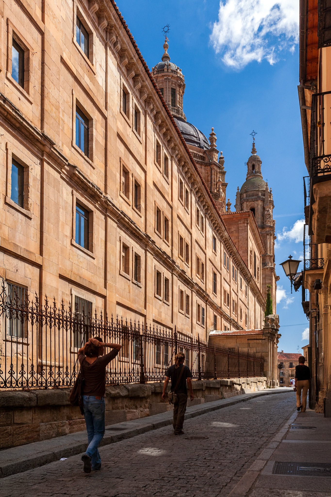 Historic cityscape featuring Pontifical University and architecture in Salamanca, Spain on a sunny day.