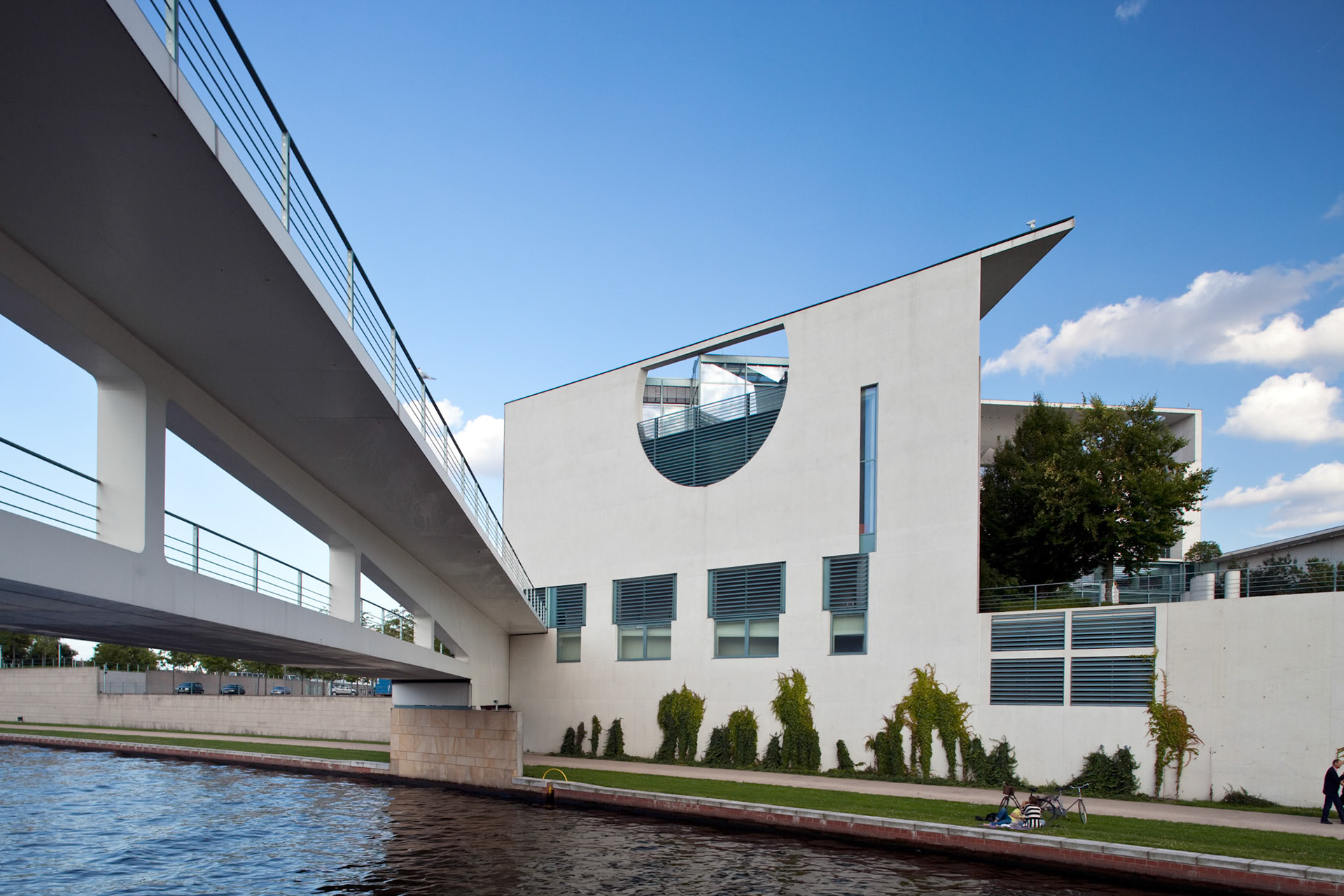 The German Chancellery showcases contemporary architecture along the Spree River in Berlin, blending functionality with striking design.