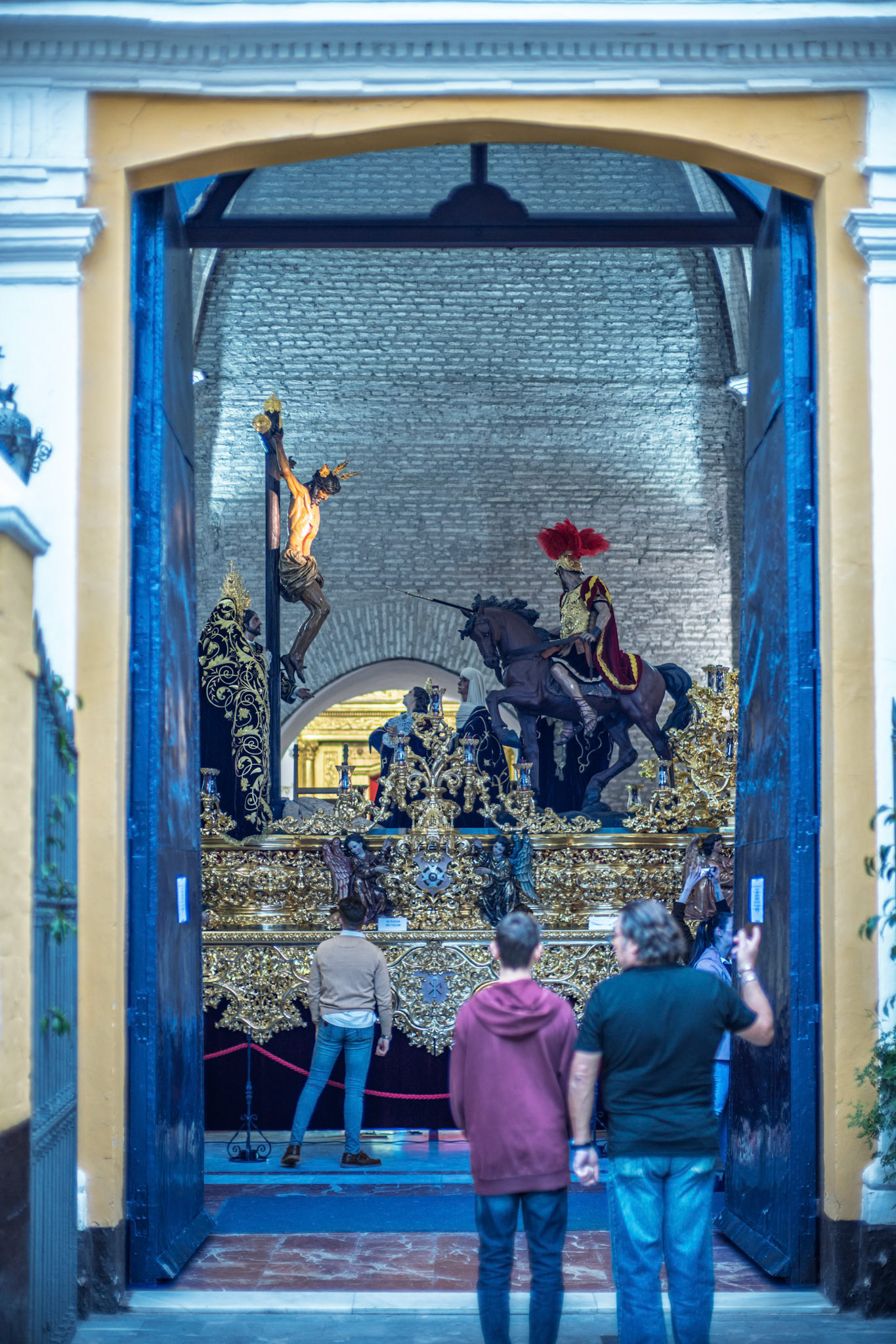 Faithful and visitors view La Lanzada Brotherhood's mystery float inside San Martin Church before Holy Week in Seville, Andalusia, Spain.