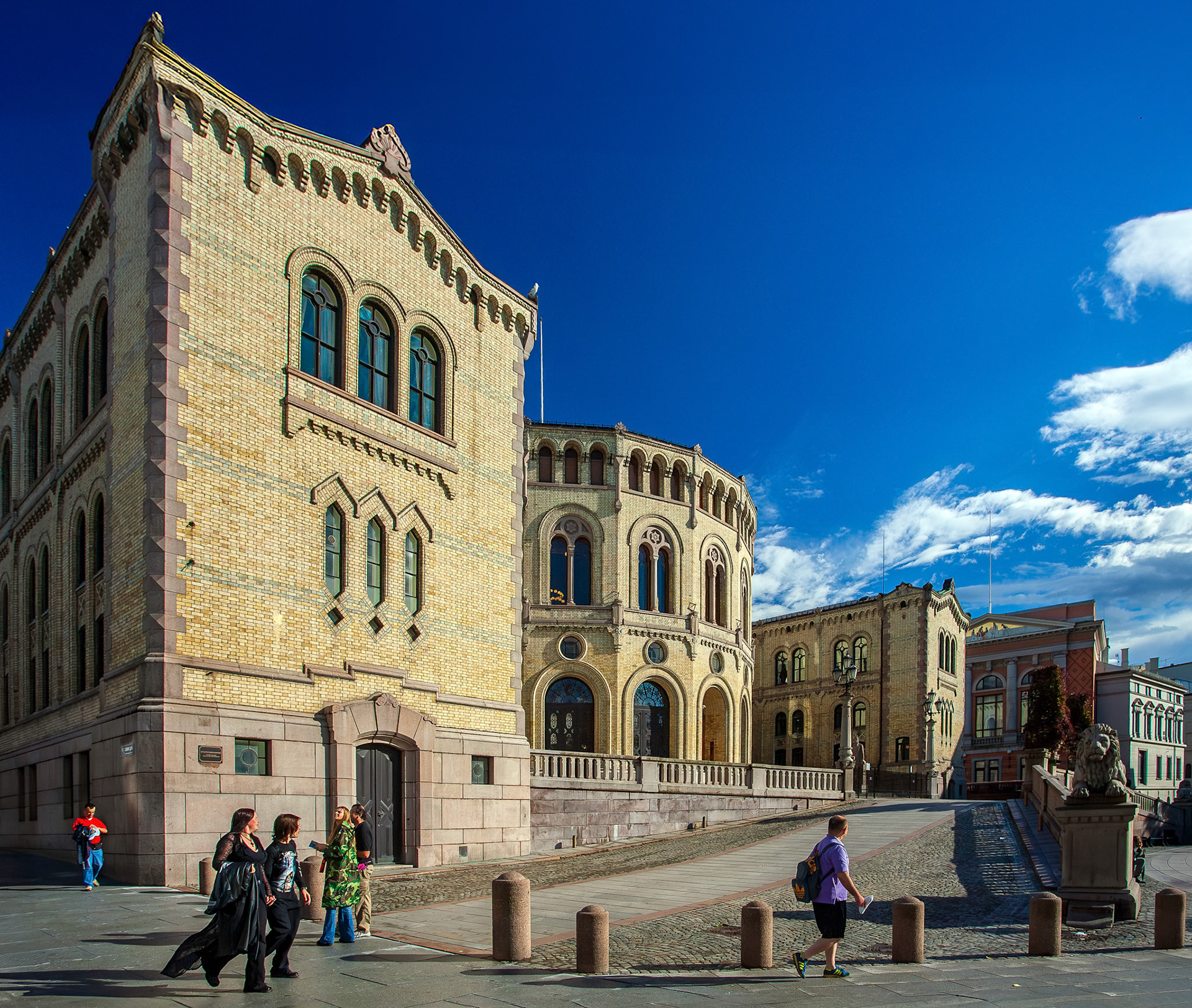 Oslo, Norway, Aug 10 2017, Visitors stroll past the Parliament building in Oslo, Norway, admiring its unique architecture and enjoying the sunny weather.