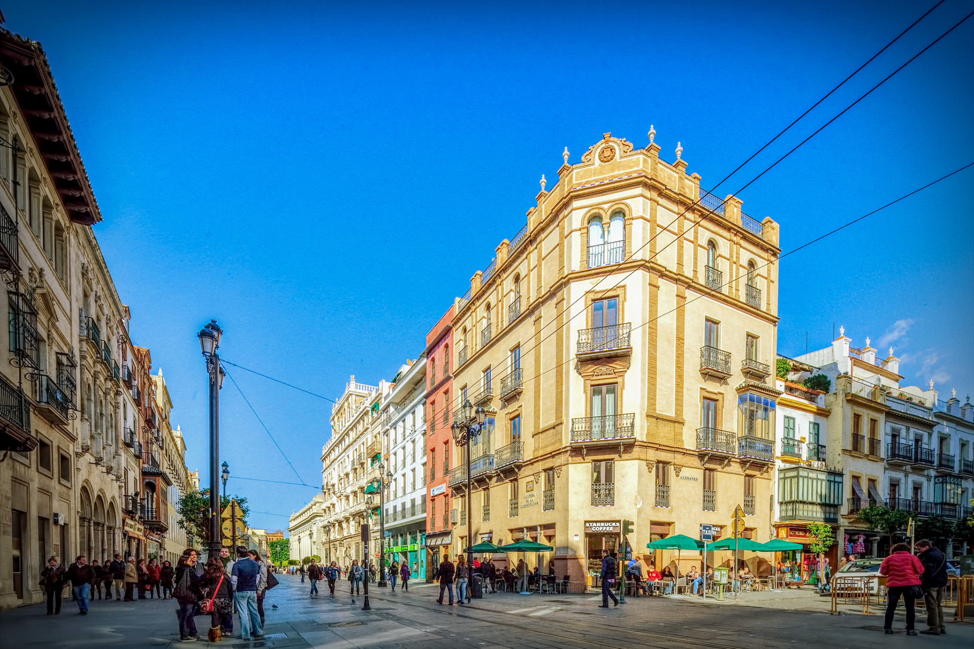 Avenida de la Constitucion (left) and Alemanes (right) street corner, Seville, Spain
