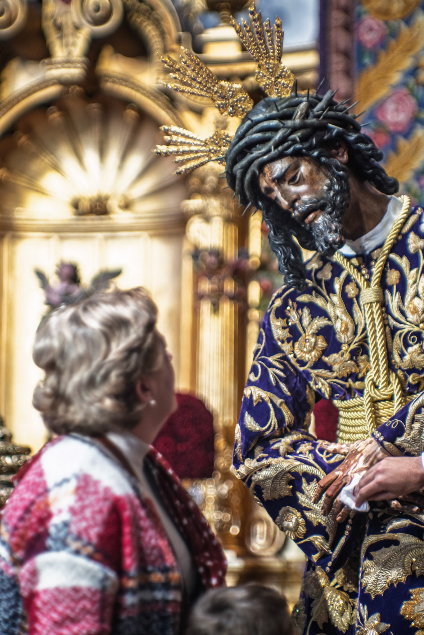 Seville, Spain, March 27 2018, A devotee looks intently at the Lord of the Gran Poder during the besamanos ceremony in Seville, Andalusia, celebrating Holy Week.