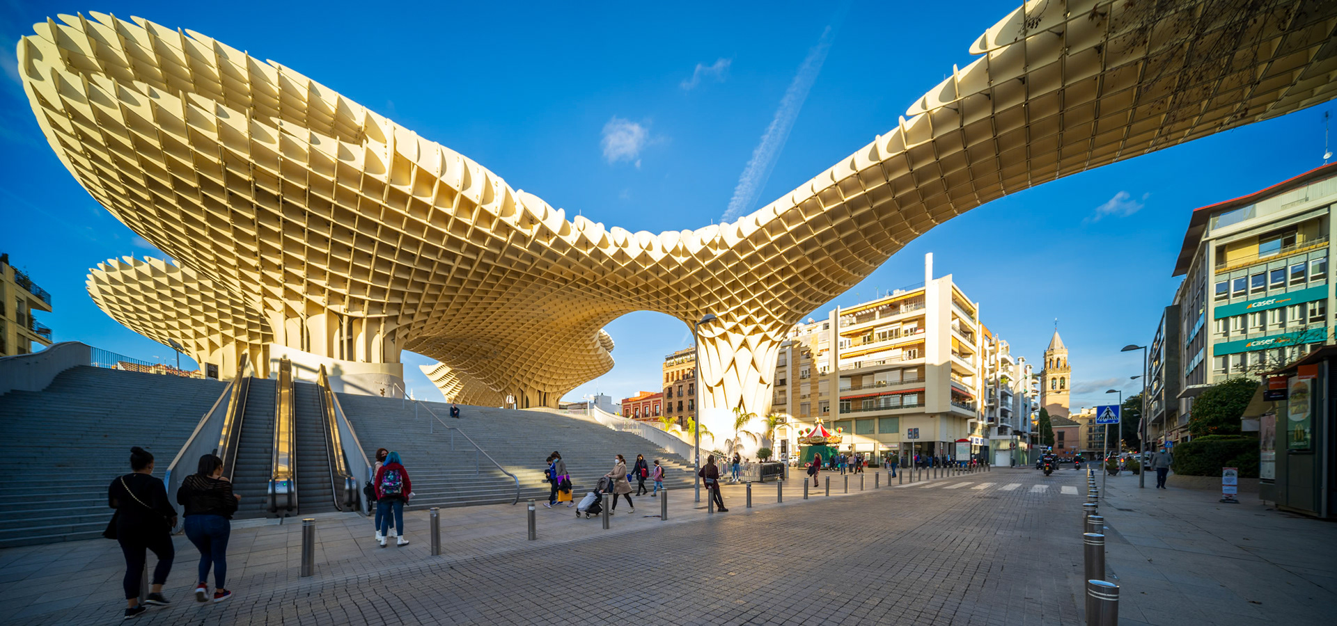 Seville, Spain, Jan 28 2021, Captivating view of Las Setas, a modern architectural masterpiece in Seville, Spain. The structure's intricate design is highlighted by a clear blue sky.