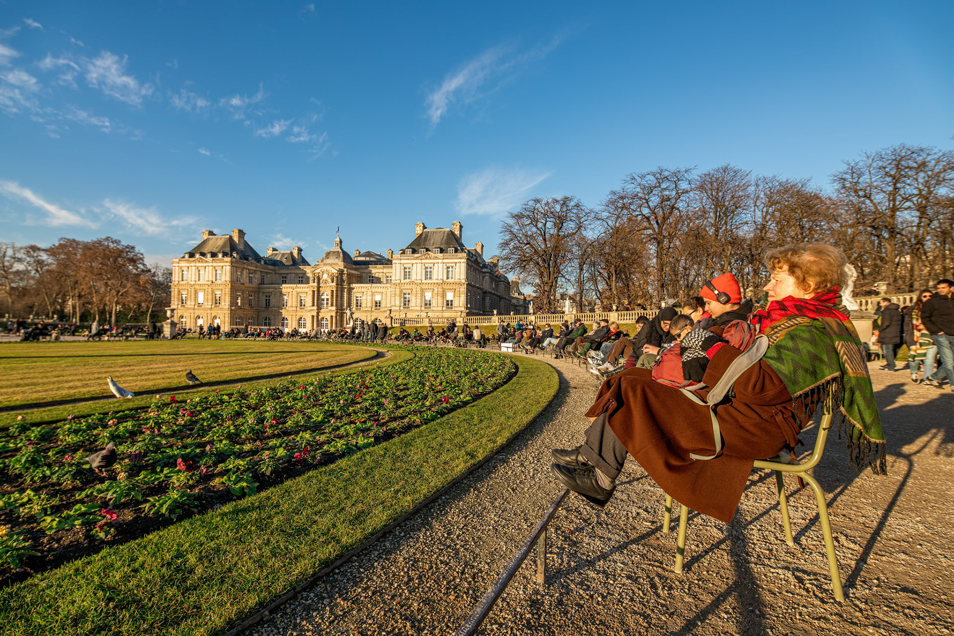 Visitors enjoy a sunny winter afternoon at the Luxembourg Palace and Gardens.