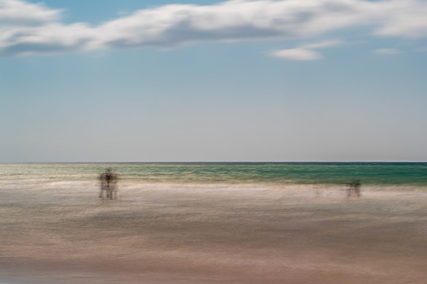 A serene long exposure coastal scene at Playa in Barbate, Andalusia, Spain.