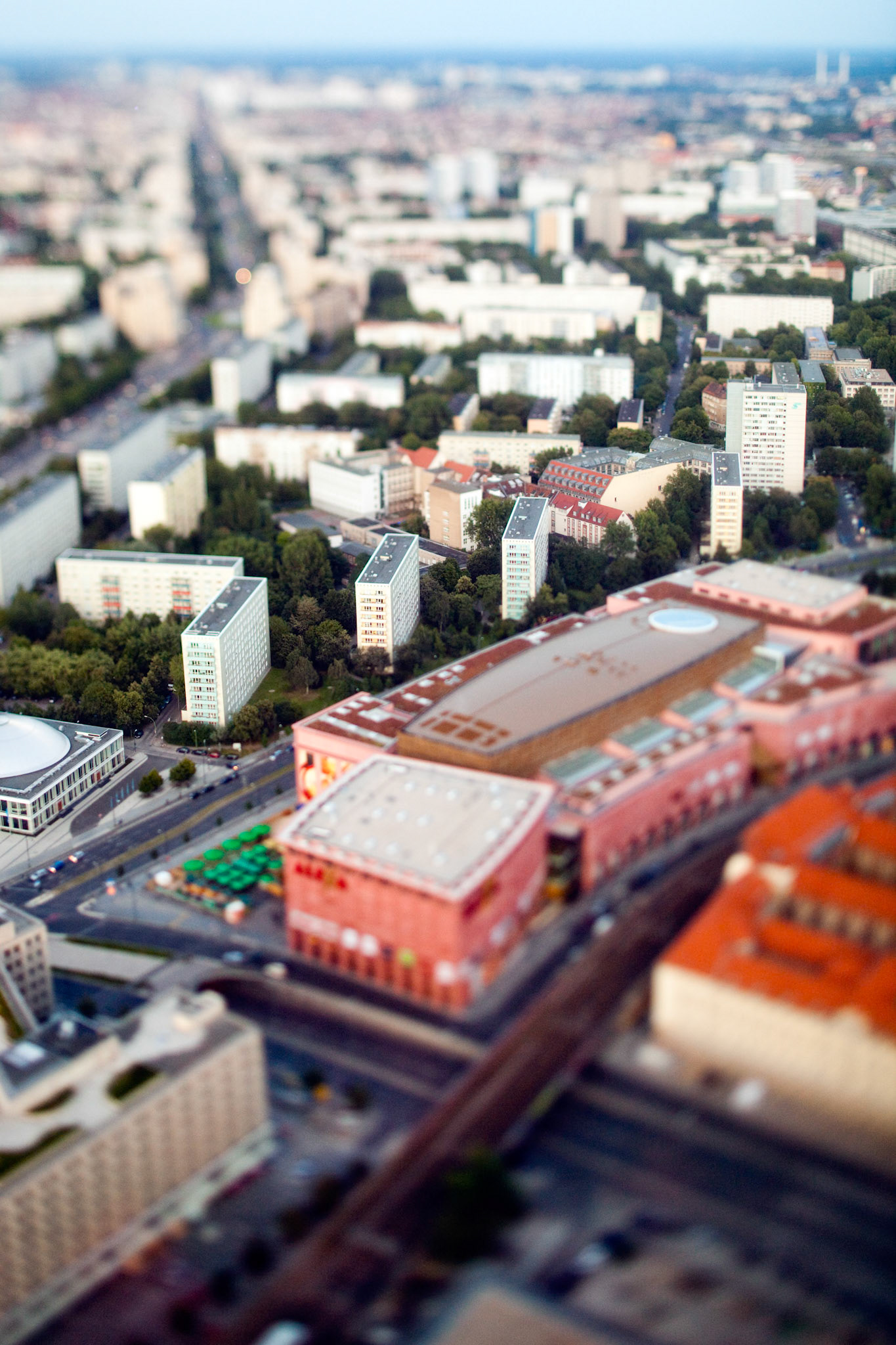 Explore the distinctive miniaturization effect over East Berlin\'s Alexanderstrasse, highlighting the urban landscape from above.