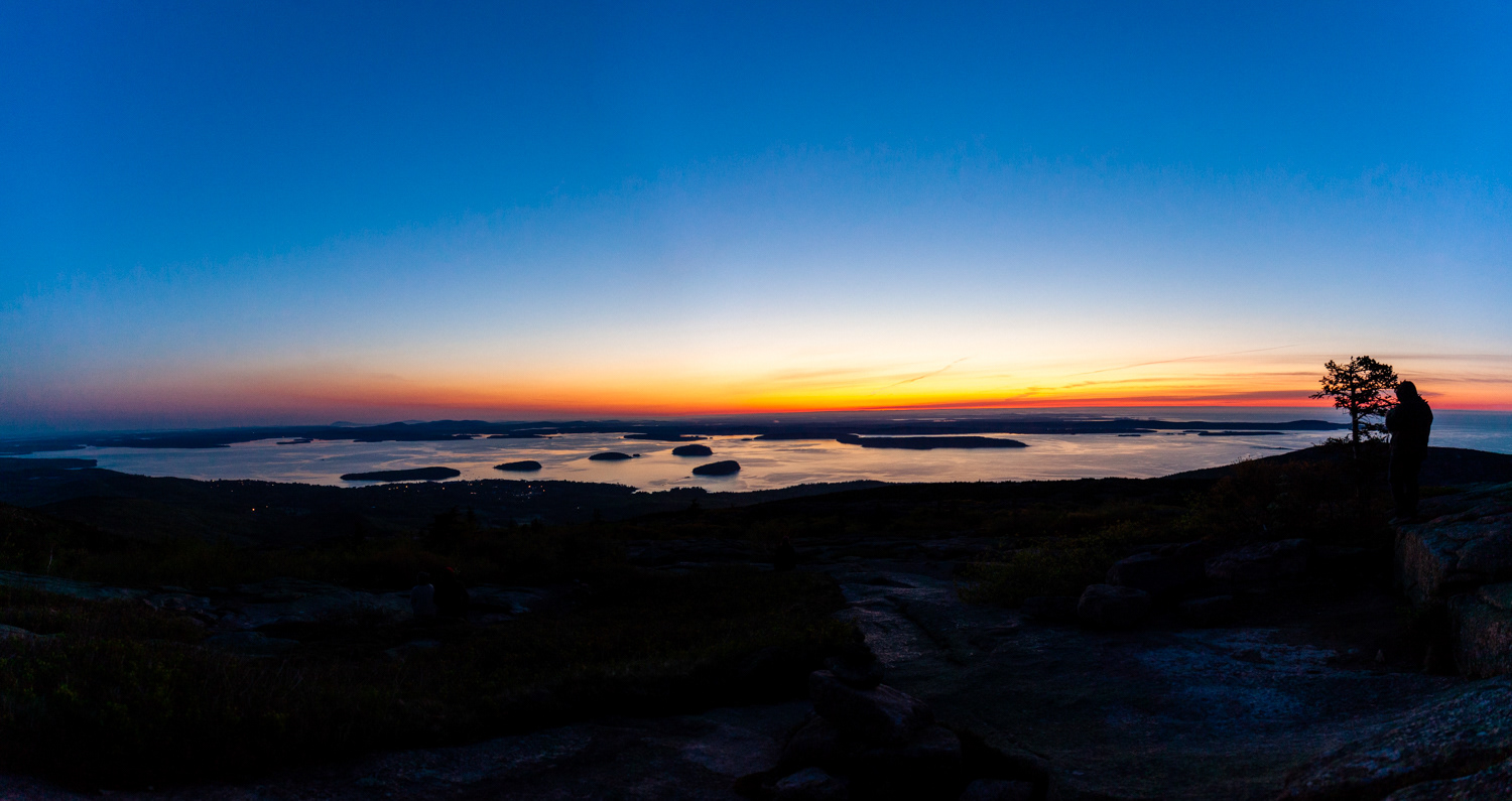 Bar Harbor, Bar Island, and the Porcupine Islands during sunrise from Cadillac Mountain.